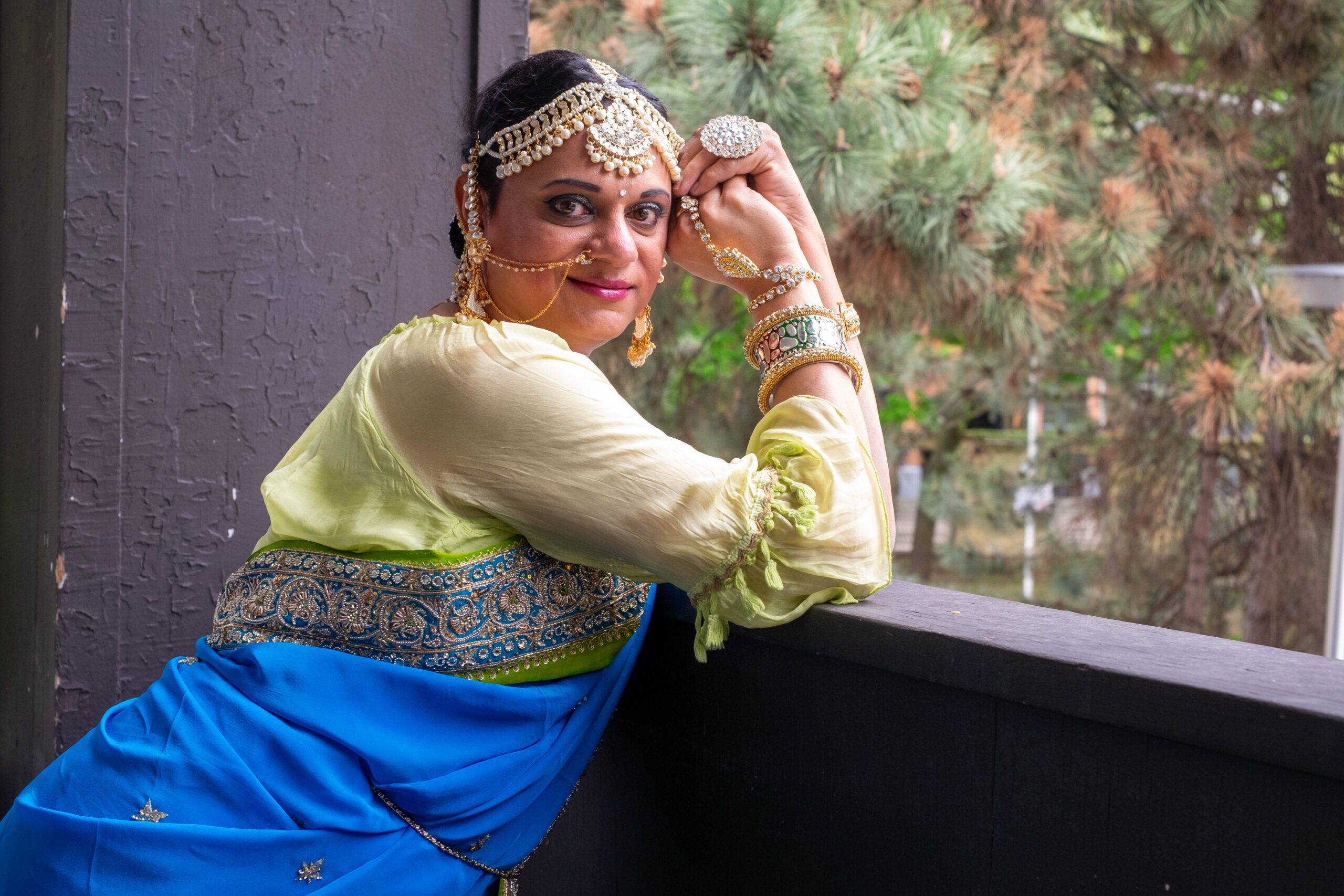 Sush posing on a balcony