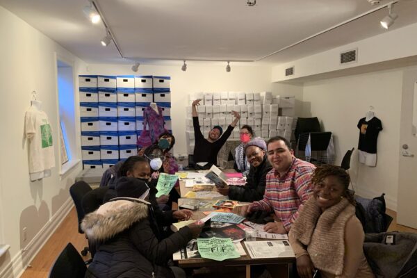 Group of folks sitting together in the ArQuives.